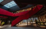 Vibrant pink staircase in the new foyer Courtyard of the Citizens Theatre