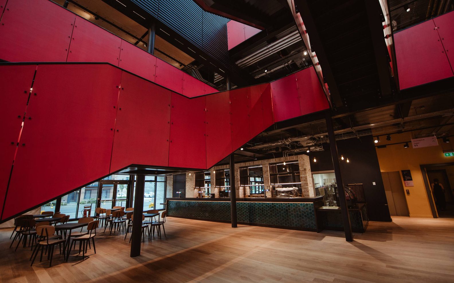 Our nw foyer and bar space, with a big bright pink staircase
