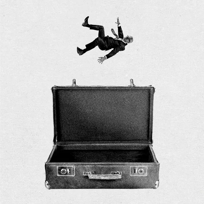 A black and white image of a man falling into a large, oversized briefcase